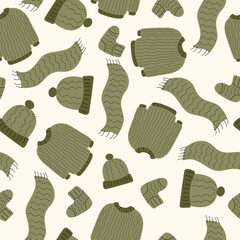Seamless pattern with knitted sweaters, scarves and hats