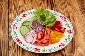 different vegetables on the wooden background