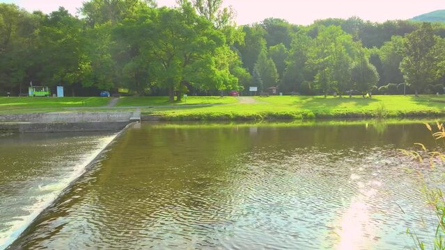 e Vistula river flowing through Ustroń and the view from the drone. Sunny summer day.