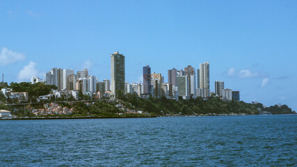 Obraz premium salvador view of all saints bay, sea with boats and buildings in the background