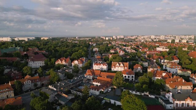 Aerial view of Gdansk. Flight over Oliwa district during sunny evening. Poland.