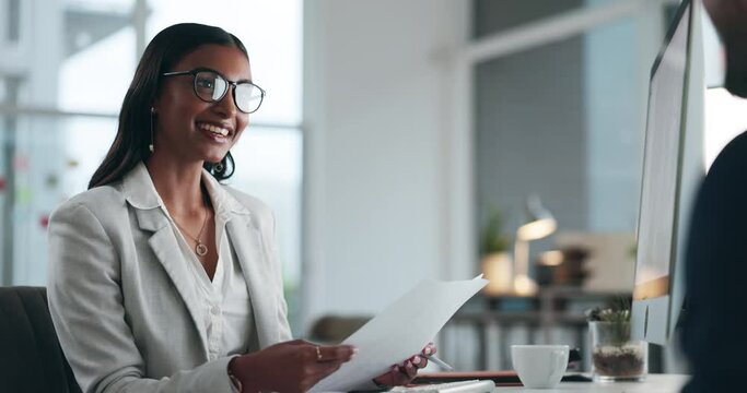 Business woman, meeting and interview with CV, documents or resume in hiring or recruiting at office. Employer talking to candidate, intern or employee about skill in recruitment process at workplace