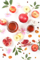 Autumn banner with honey, apples, pomegranates, flowers, dried fruits on a light background with place for text, composition for the Jewish holiday Rosh Hashan, Hello autumn and thanksgiving day