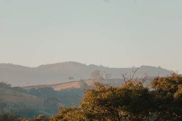 views of the mountains in a foggy sky