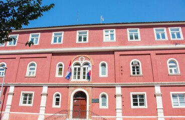Historical red building right next to the  Park of Heads Zadar in the state of Zadar Croatia