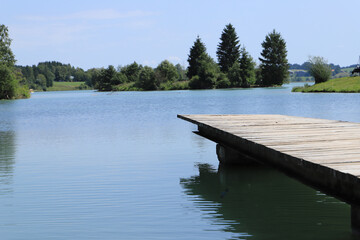 Obraz premium wooden pier on the water