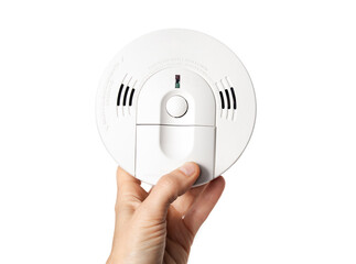 Smoke detector with carbon monoxide alarm in hand of homeowner or electrician. Hard wired with...