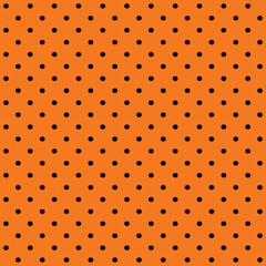 Seamless pattern orange polka dot black background, Halloween theme