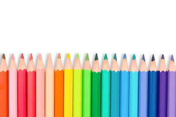 Isolated set of rainbow color wooden pencils. Multicolored bright background. Education - back to...