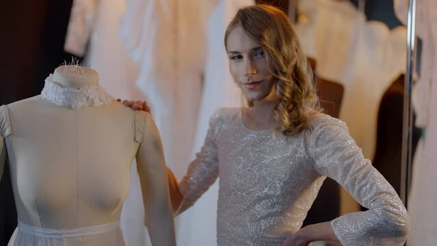 portrait of non-binary gay man in wedding dress looking like bride, lgbt community and diversity