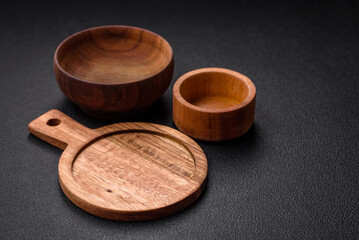 Empty round kitchen wooden cutting board in brown color