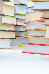 Stack of books on white background