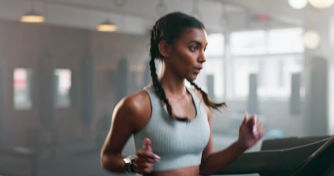 Woman, running on treadmill and cardio with fitness in gym, training and breathing with health and wellness. Indian, female runner and exercise equipment, athlete and sports with speed and workout