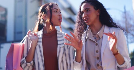 Happy woman, friends and talking with shopping bag in city together about discount, sale or outdoor purchase. Women walking in happiness or conversation from retail deal or promotion in an urban town - Powered by Adobe