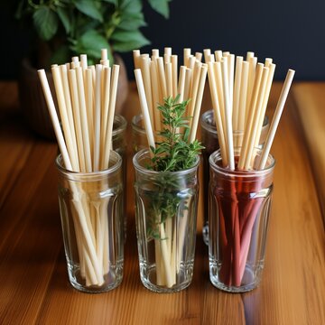 Ecological bamboo cocktail tubes for lemonades and drinks. Concept: Safe eco-friendly tableware without harm to the planet. 