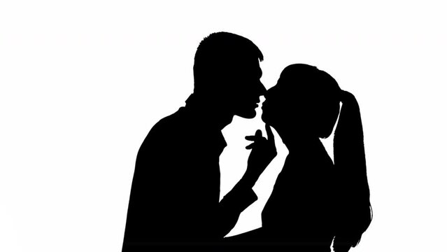Silhouette of a kissing couple of a man with a woman. black and white mask