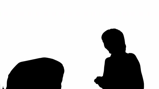 Silhouette of arguing man and woman. black and white mask