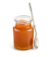 Jar with sweet apricot jam on white background
