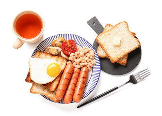 Plate with tasty English breakfast and cup of tea on white background