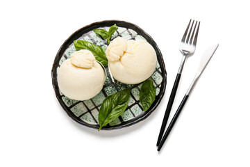 Plate of tasty Burrata cheese with basil on white background