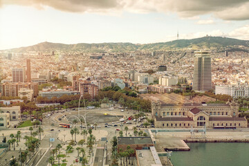 Placa de les Drassanes square by the Barcelona port with the city in the background, Barcelona, Spain