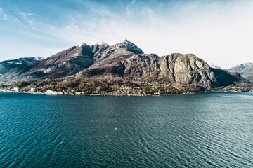 Obraz premium Aerial view of lake Como with the Alps and villages around the lake, Como, Italy