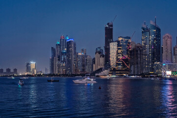 Fototapeta na wymiar Cityscape of Marina Dubai with Marina Beach at night, UAE