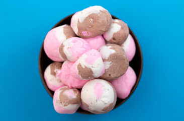 Dehydrated Freeze Dried Neapolitan Three Flavored Saltwater Taffy on a Blue Background