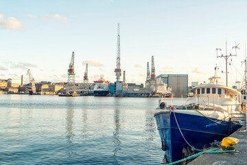 Port of Helsinki with cranes and boat in the foreground, Helsinki, Finland