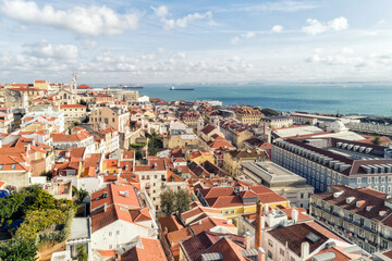 Naklejka na ściany i meble Aerial view of the skyline and cityscape of the old city of Lisbon in Portugal