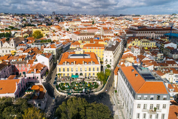 Aerial of the old city with Pharmacy Museum with cafe in Lisbon, Portugal