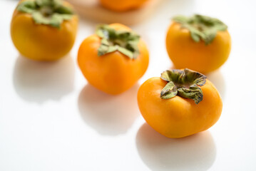 Fresh persimmon fruit in autumn season