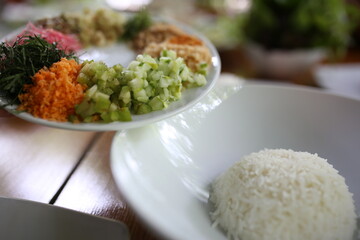 Thai Southern Spicy Rice Salad with Vegetables, Budu Thai southern styled fish sauce.
