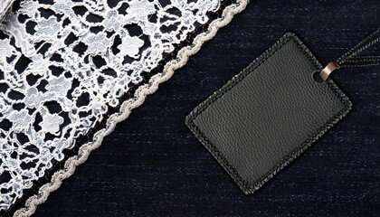 denim fabric texture, A black denim background adorned with delicate lace borders and a small...