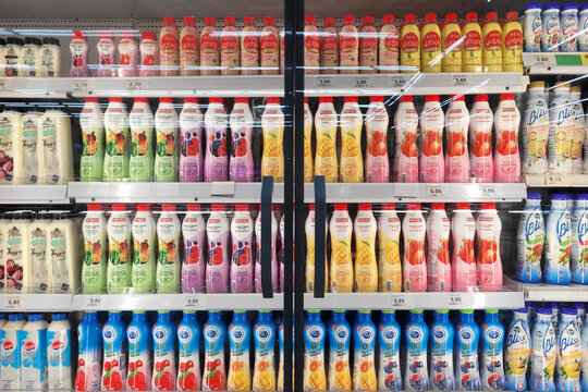 PENANG, MALAYSIA - 11 JULY 2023: Interior view of huge glass fridge with various choice of beverages in Giant grocery store. Giant is the coolest fresh premium supermarket in Malaysia.