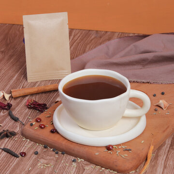 cup of coffee with sticks