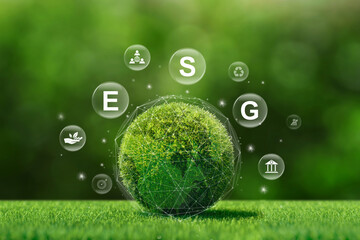 A green ball with ESG icon for Environment Social and Governance surrounds an idea for a sustainable and ethical business on the Network connection. ESG and World sustainable environment concept.
