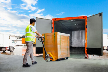 Workers Unloading Heavy Pallet Boxes into Container Truck. Loading Dock Warehouse. Supply Chain,...