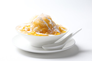 chilled fresh mango fruit sago ice snow kacang asian cendol sweet dessert with coconut milk cream...
