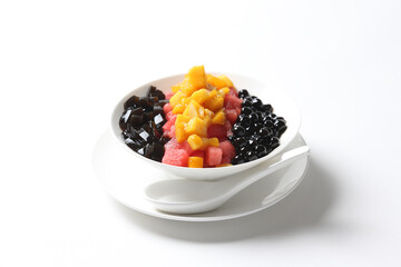 chilled mango and watermelon fruit snow ice blended with boba bubble pearl and herbal grass jelly in white bowl sweet soup dessert halal food vegan menu for Hong Kong cafe