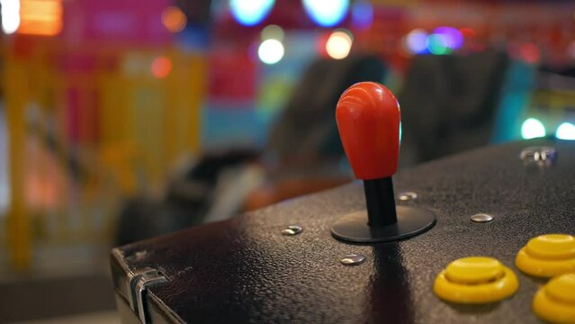 closeup of button on games machine.