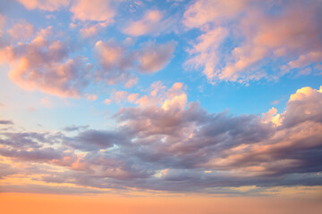 Naklejka na ściany i meble Amazing real sky - Gentle colors Panoramic Sunrise Sundown Sanset Sky with colorful clouds. Without any birds. Large panoramic sky with sun. Cloudscape