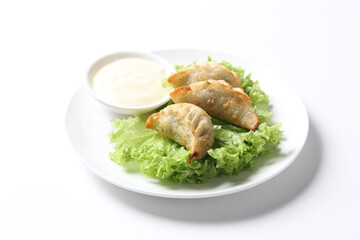 deep fried crispy meat dumpling wanton har gao in vegetable salad plate appetiser breakfast dim sum Halal food menu serve with tartar salad sauce for Hong Kong cafe