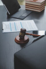 Business and lawyers discussing contract papers with brass scale on desk in office. Law, legal...