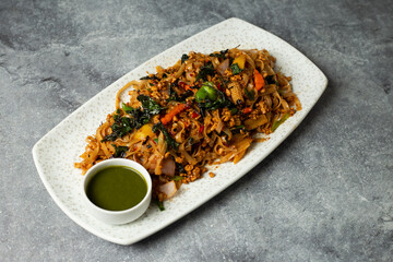 Thai Basil Noodles with sauce served in dish isolated on background top view of bangladesh food