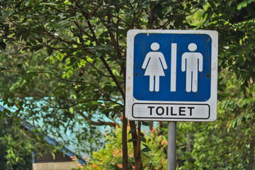 close up of toilet sign.
