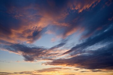Colorful cloudy sky at sunset. Gradient color. Sky texture, abstract nature background