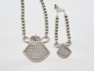 Silver and gemstones jewelry on white background