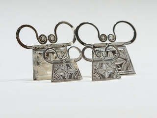 Silver and gemstones jewelry on white background