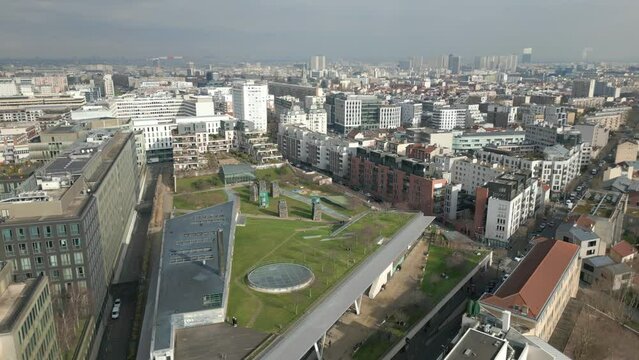 Atypical shopping centre on rooftop called La Vache Noire in Arcueil, France with roof gardens. Aerial drone view